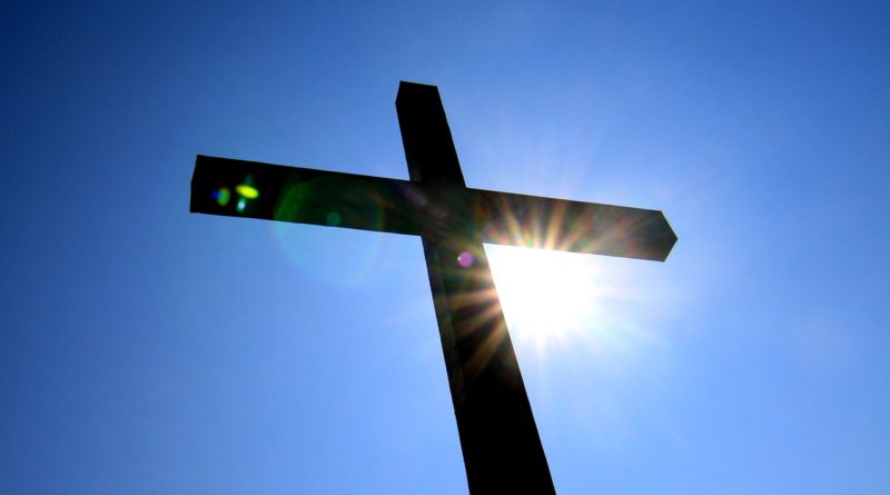 Cross silhouette, sun